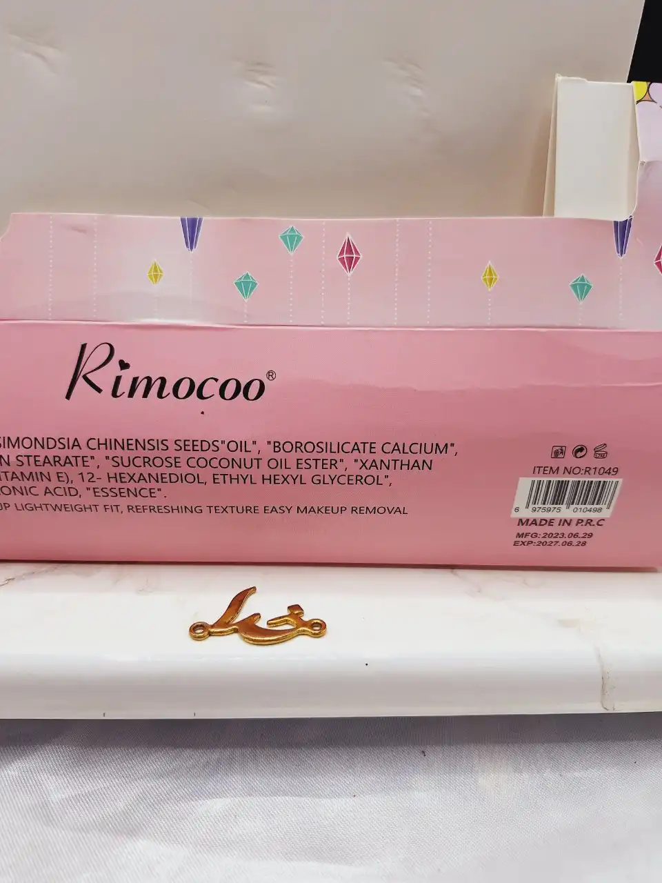 هایلایتر مایع صورت و بدن ریموکو Rimocoo کد R 1049