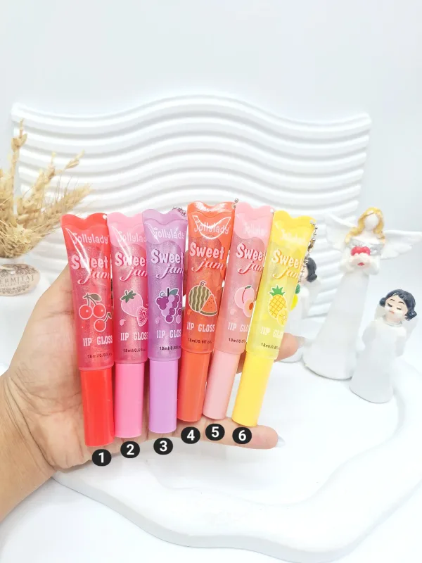 لیپ گلاس تیوپی شاین دار به همراه آویز میوه ای برند سویت کد 0012